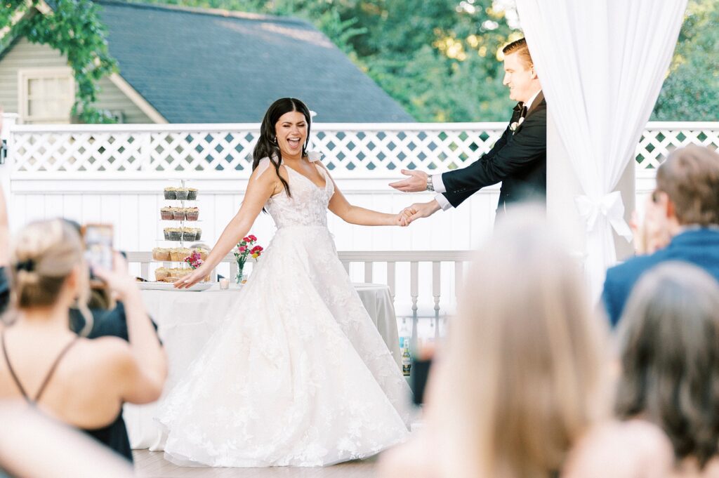 bride and groom dance under tent during fall wedding at Whitehead Manor