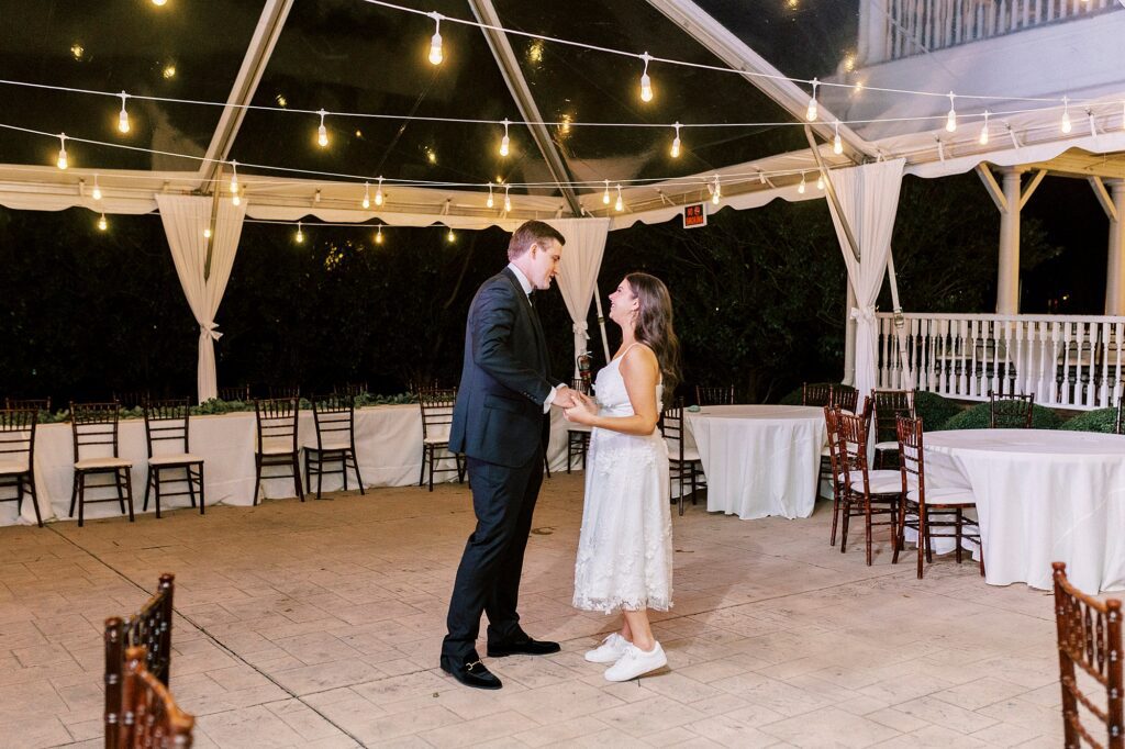 bride and groom dance privately under clear tent at Whitehead Manor