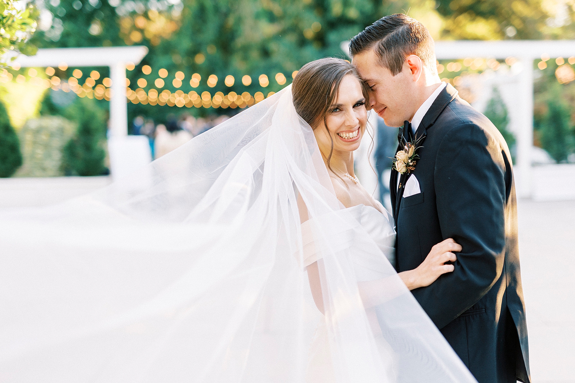 groom leans head into bride's forehead during fall wedding day at Separk Mansion