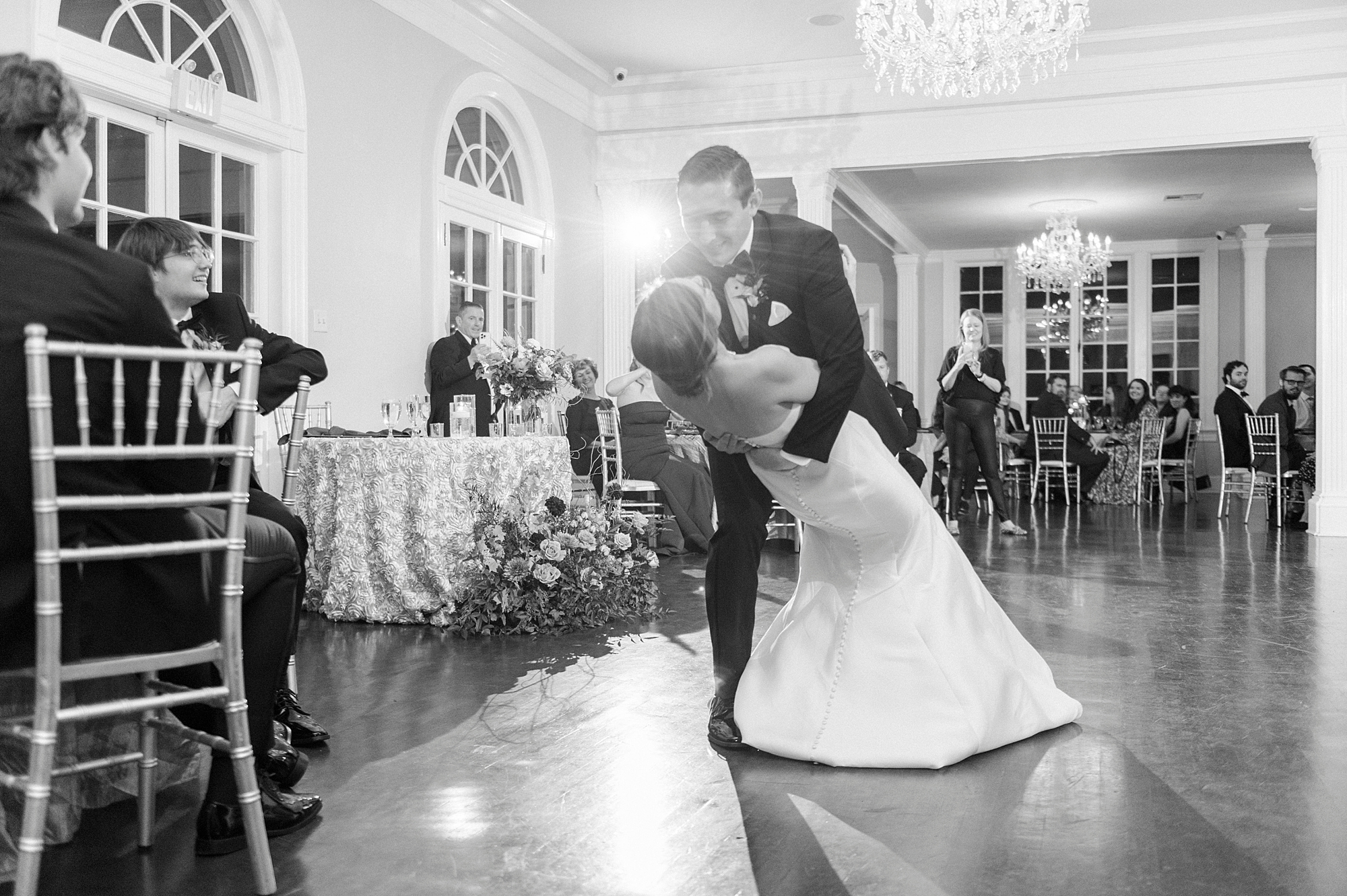 bride and groom dance dipping in center of dance floor at Separk Mansion
