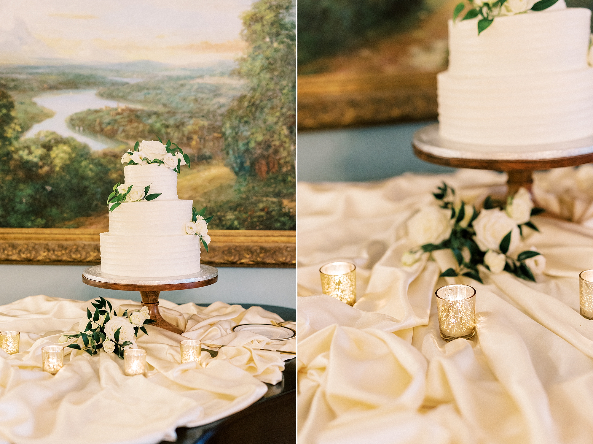 tiered wedding cake with greenery on table with fabric and gold candles 