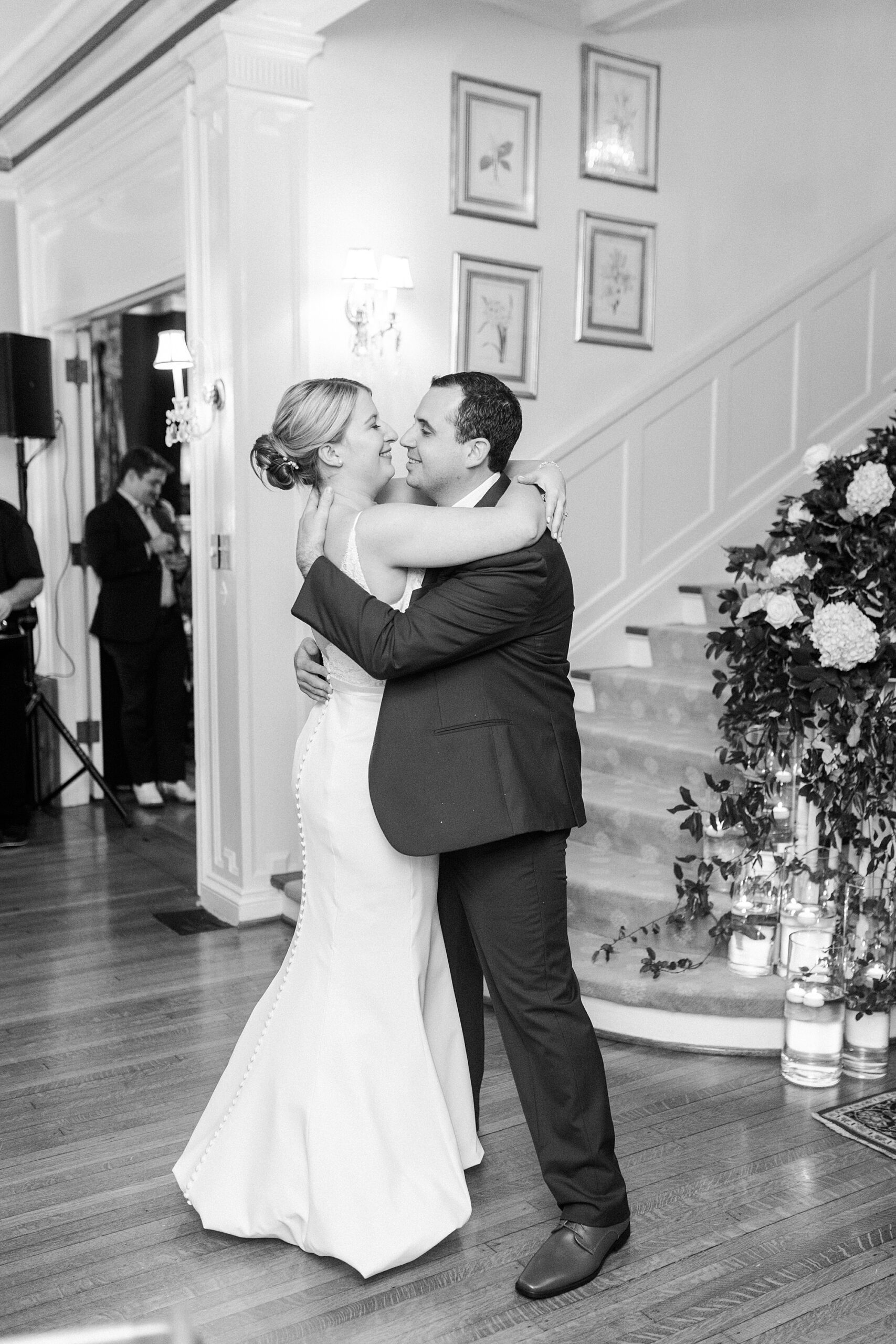 newlyweds lean together during first dance at the Morehead Inn