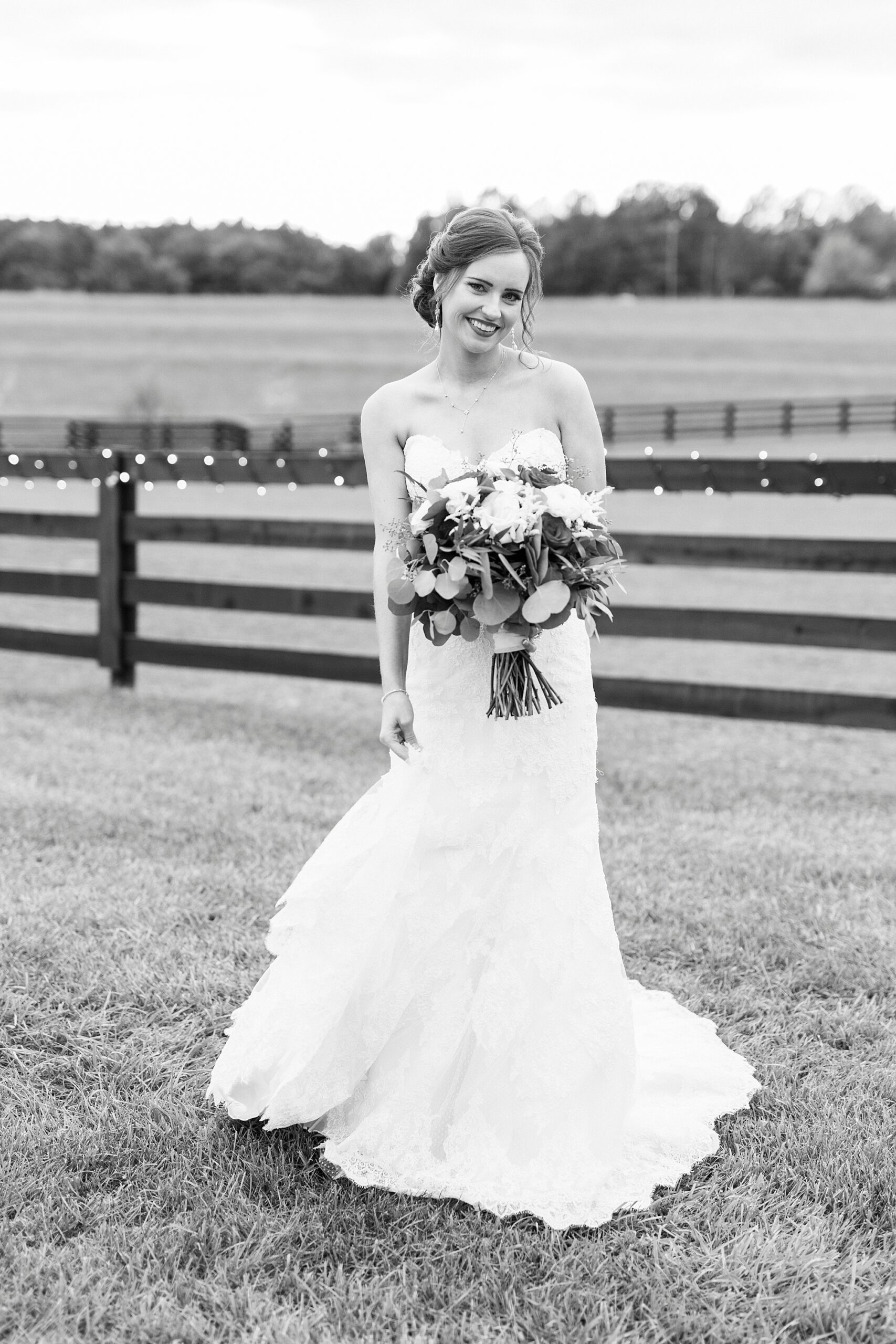 bride poses with hip out during Chickadee Hill Farms bridal portraits 