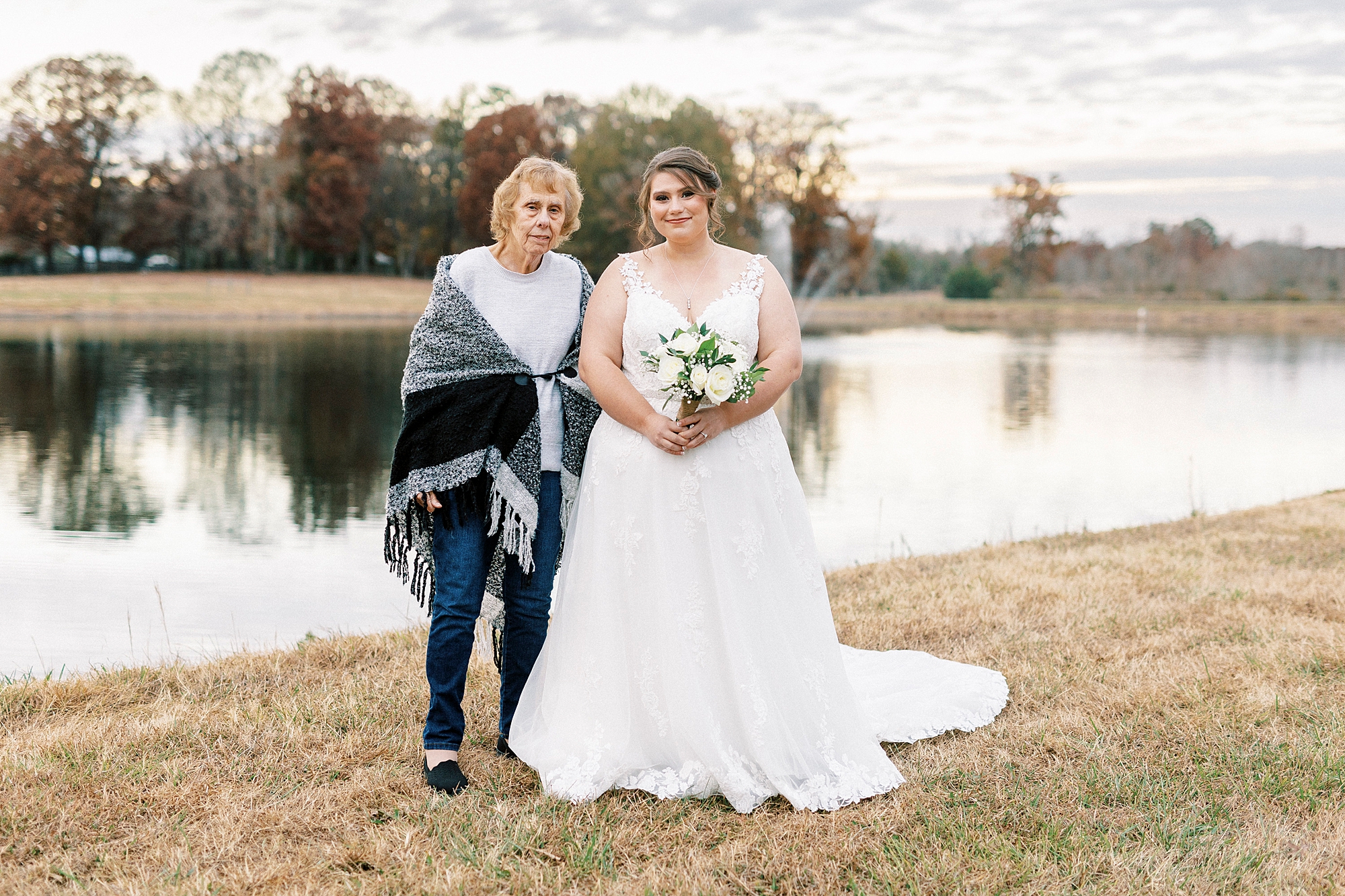 bride and grandmother hug during bridal portraits in NC