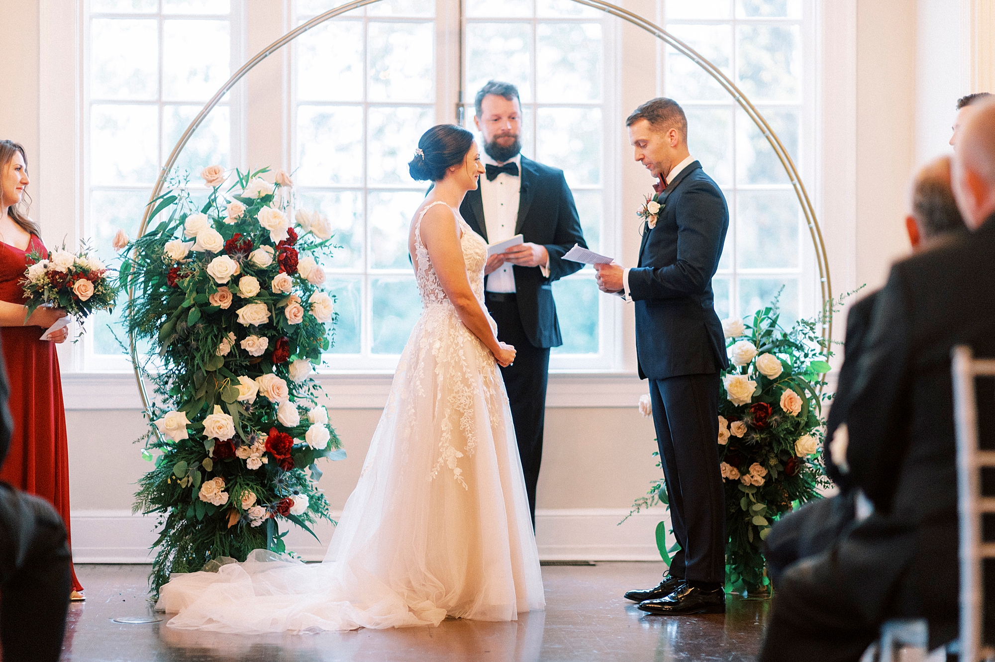newlyweds exchange vows during winter wedding ceremony at Separk Mansion