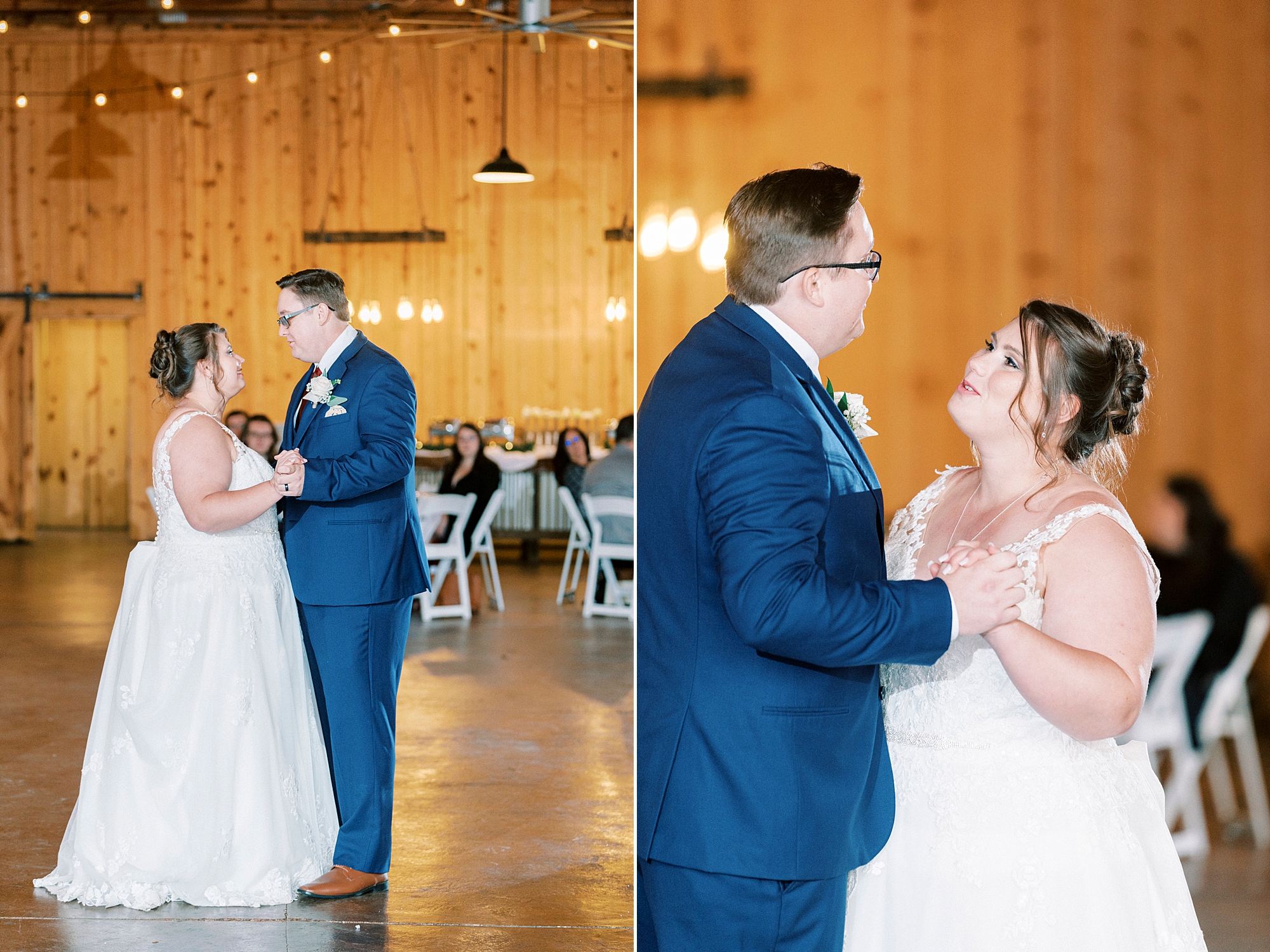 bride smiles up at groom during first dance in barn at the Farm at Brusharbor