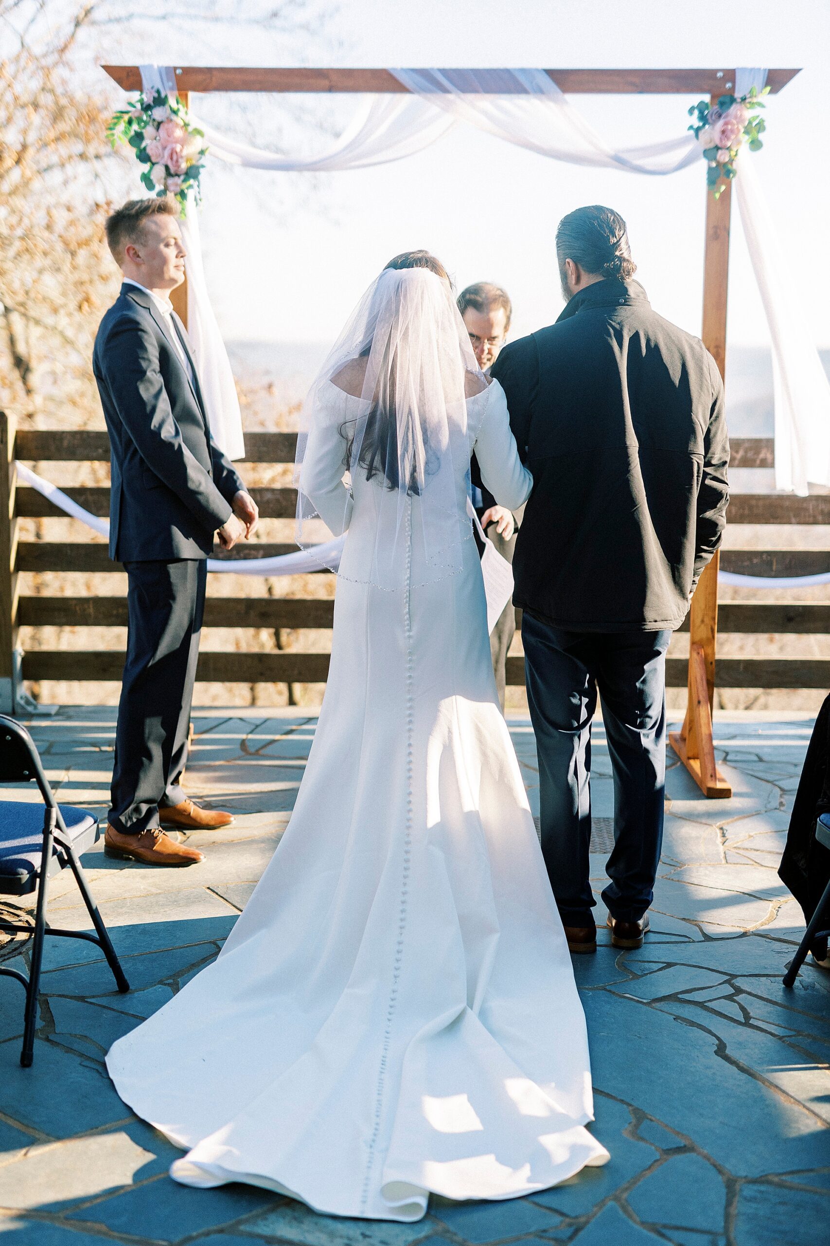 father walks bride to early morning wedding ceremony on Morrow Mountain