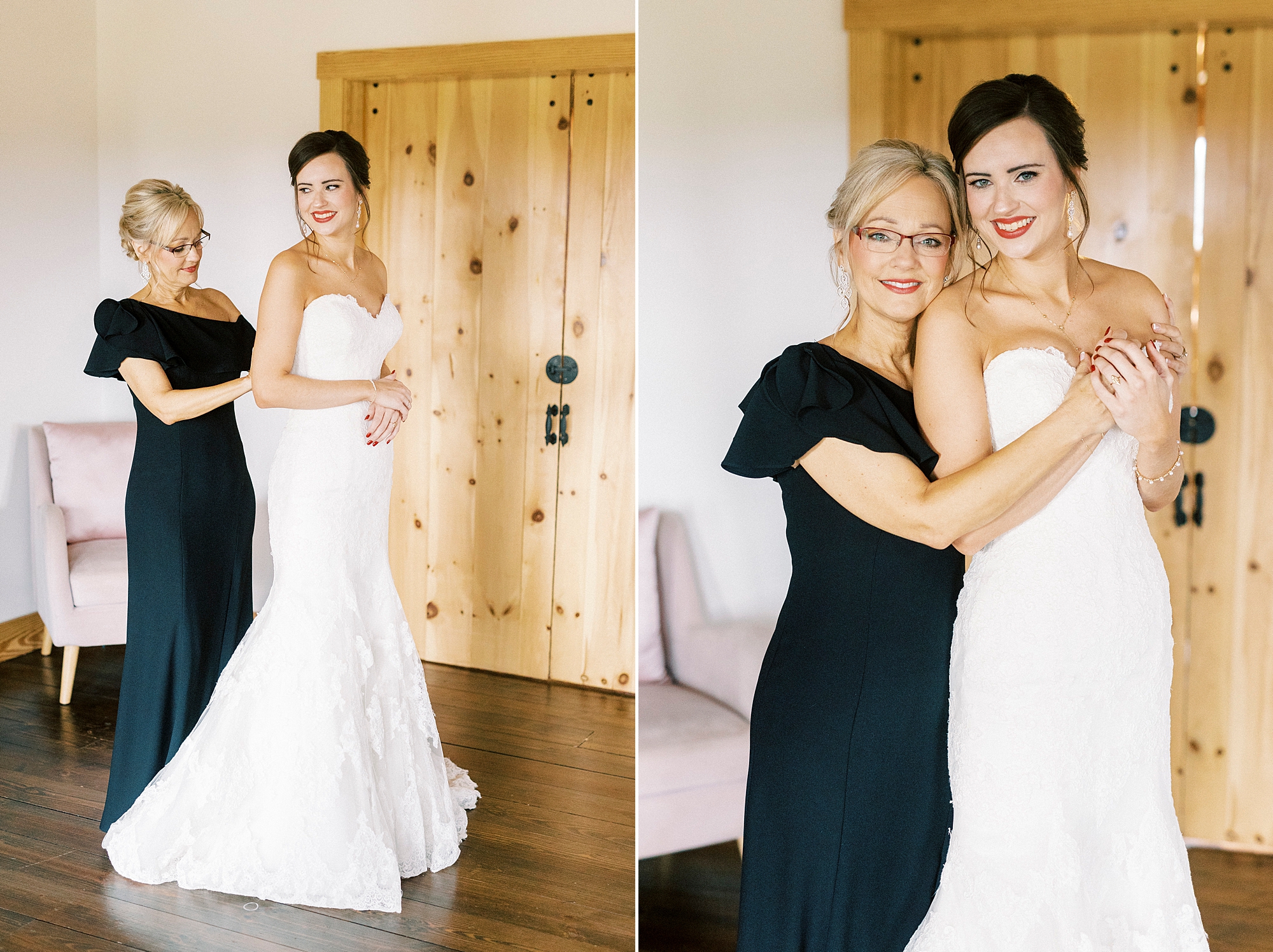 mother in navy blue gown helps bride into wedding dress