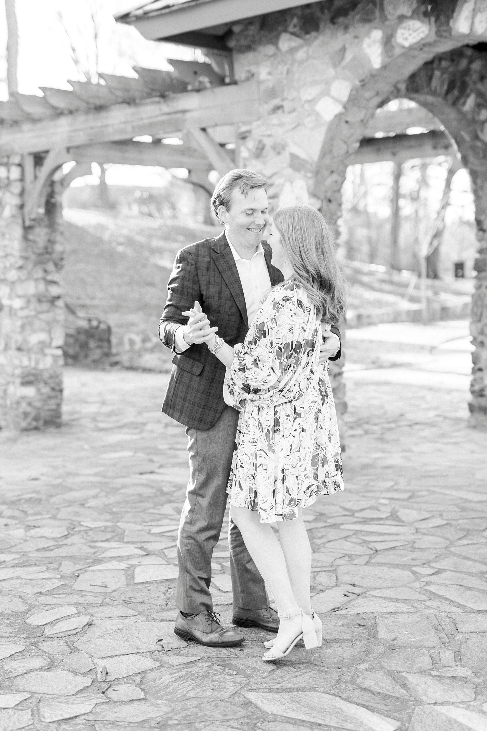 bride and groom dance during Independence Park engagement portraits