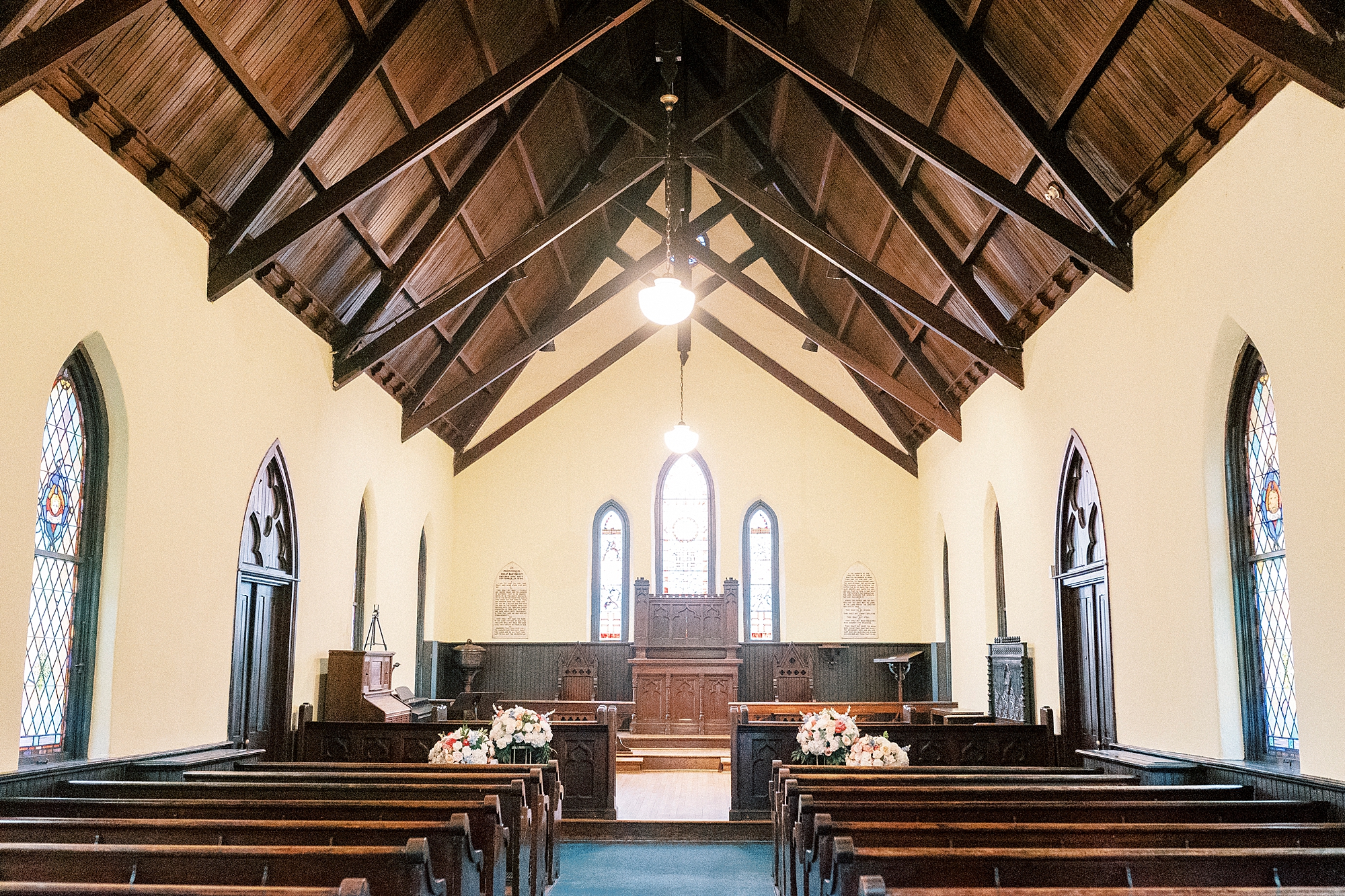 dark wood pews inside historic St. Mary's Chapel