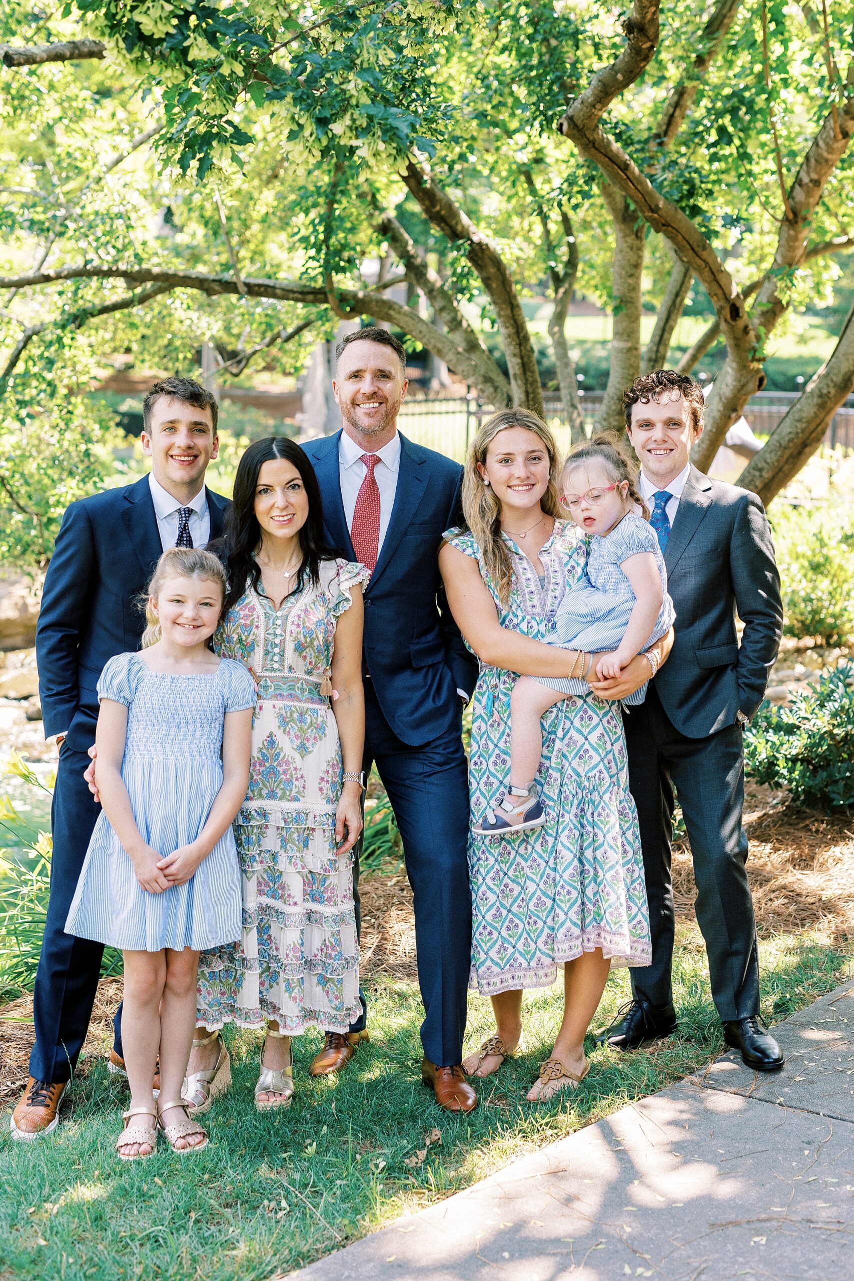 parents stand with children during Cullman Park family phots
