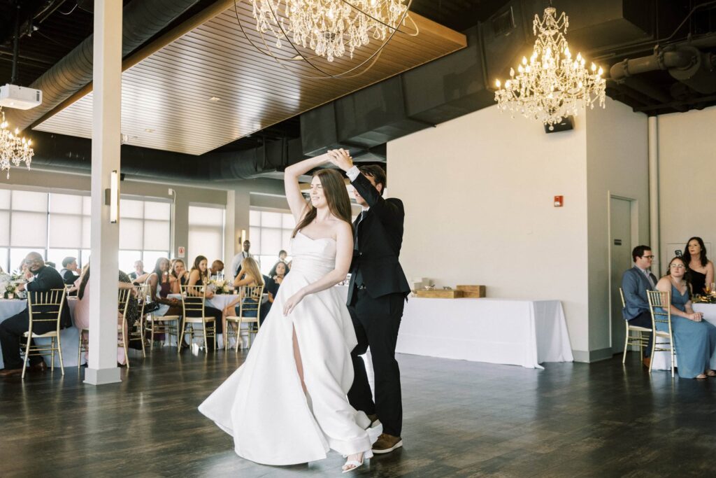 bride and groom perform first dance at terrace at cedar hill wedding venue in uptown Charlotte 